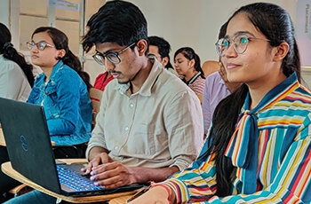 Students in a classroom learning digital marketing